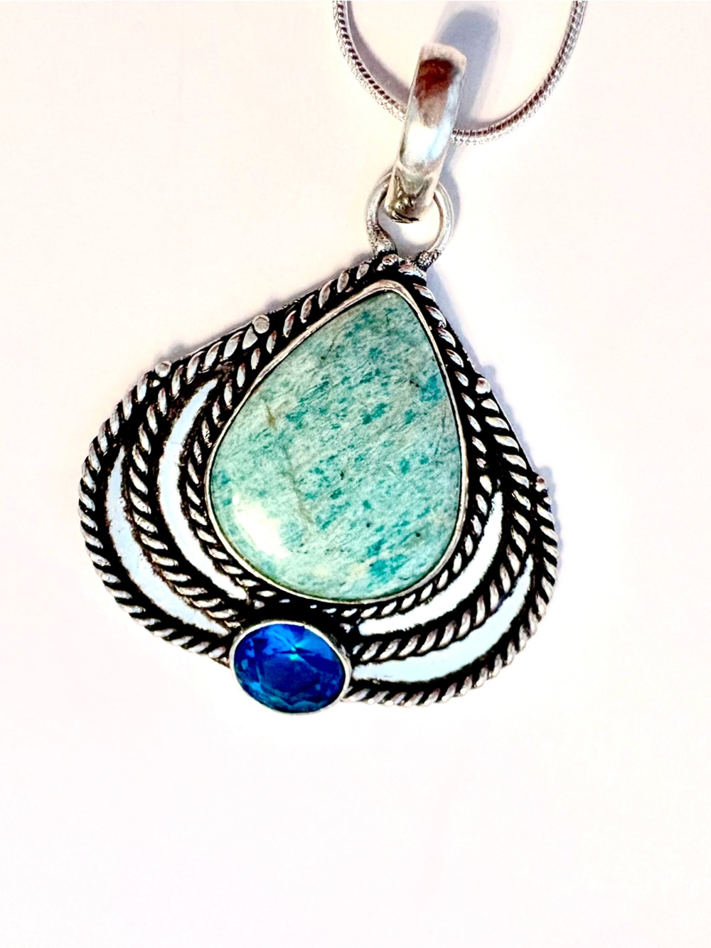 2 inch. 925 marked , Amazonite  and Blue Topaz pendant on s silver chain.